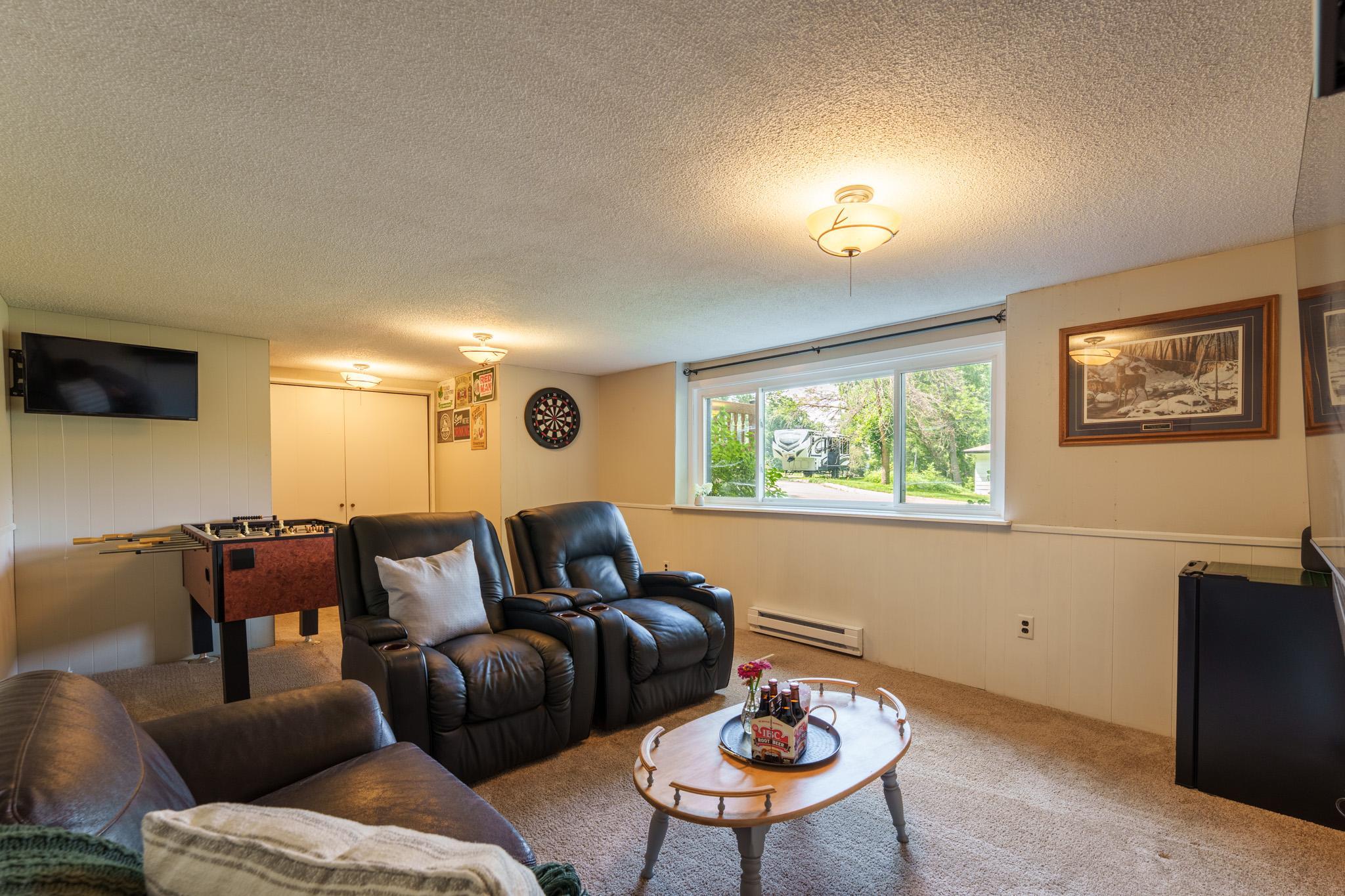 The lowest level offers a spacious family room, giving everyone another place to spread out for movie nights, game nights, or simply relaxing.