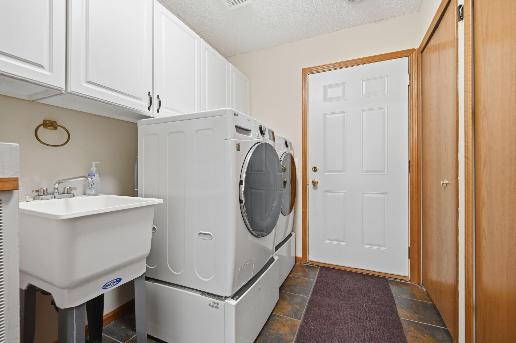 Laundry Room- An uncommon feature is the utility sink.