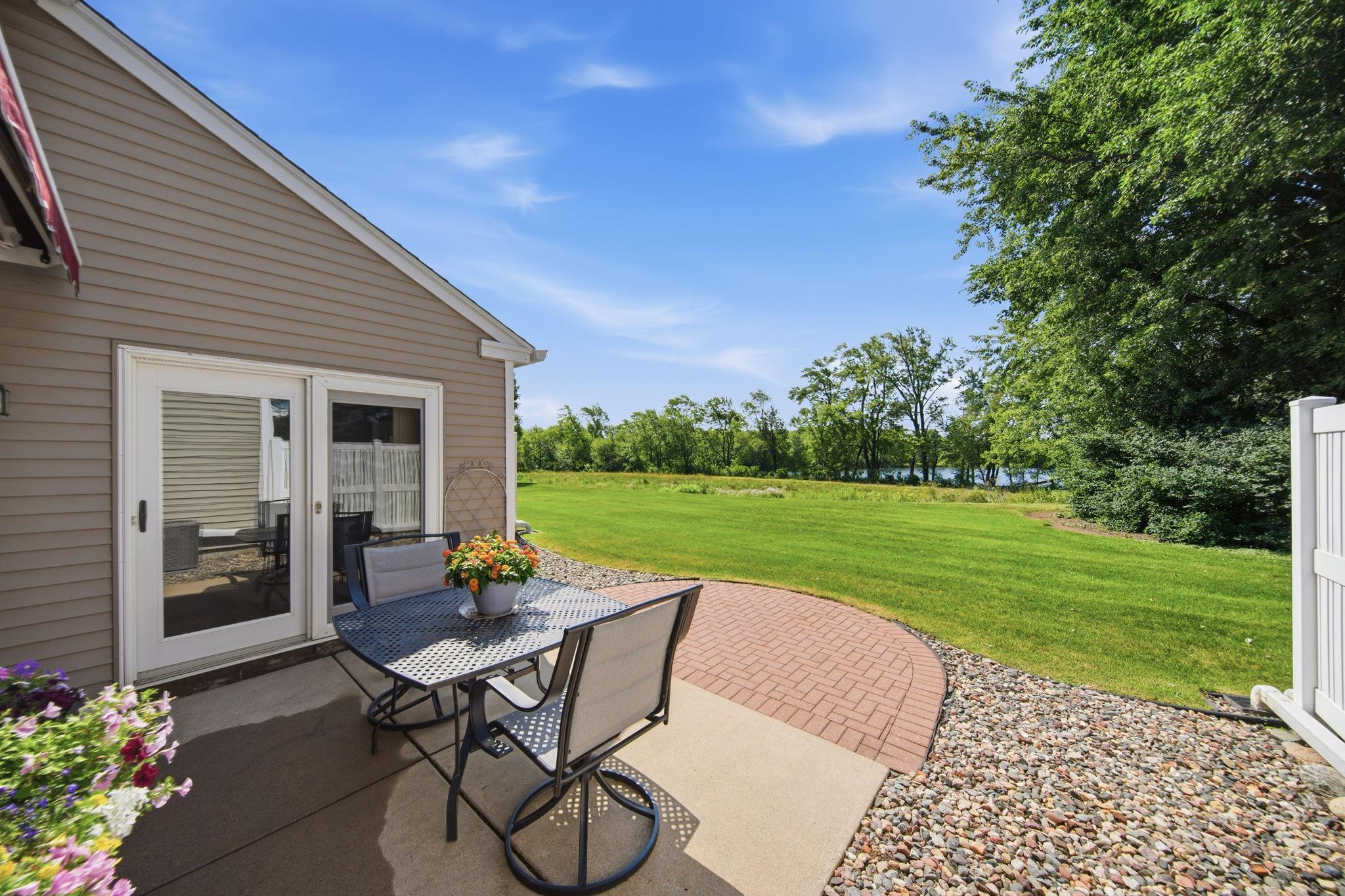 What a view! Enjoy the privacy, lake, and walk path right out the back door.