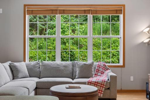 The location of this home in the neighborhood is unique, offering this is spectacular view out the front of the house. Much of the greenery will remain all year, offering privacy and lovely views, even in the winter.