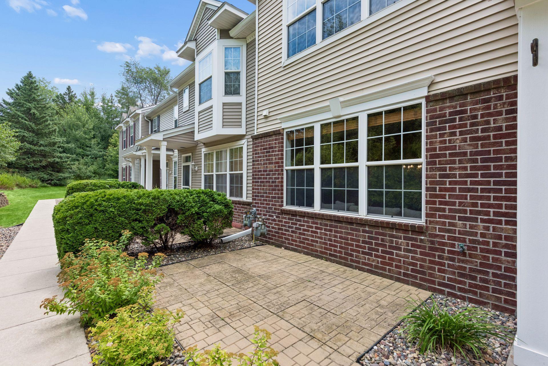 Front patio is private and looks out at the greenery.