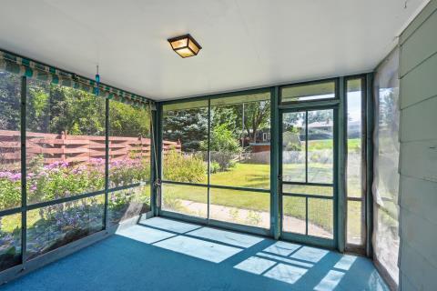 screen porch leads to deck