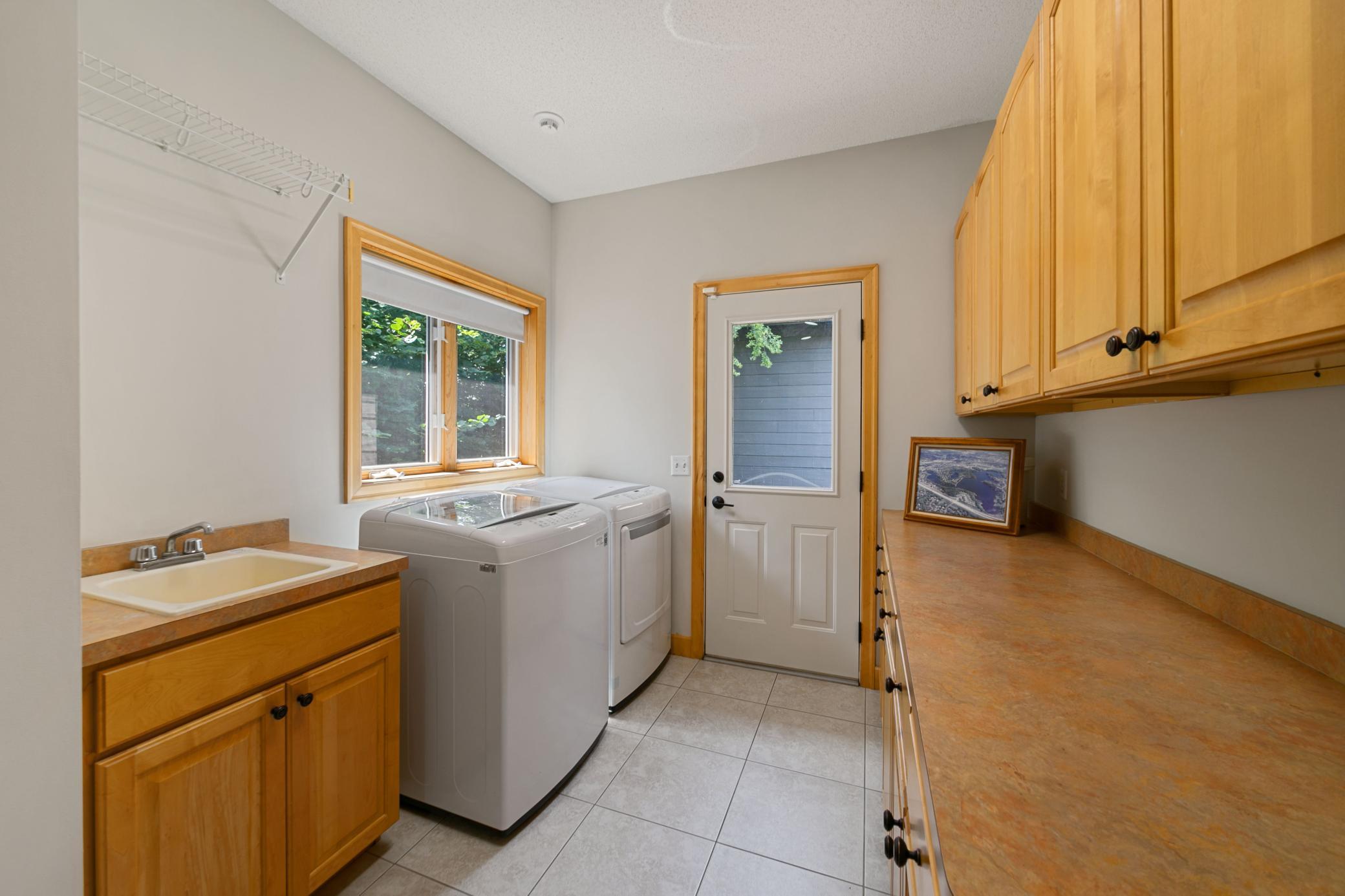 Main floor laundry-off of garage entry and hallway