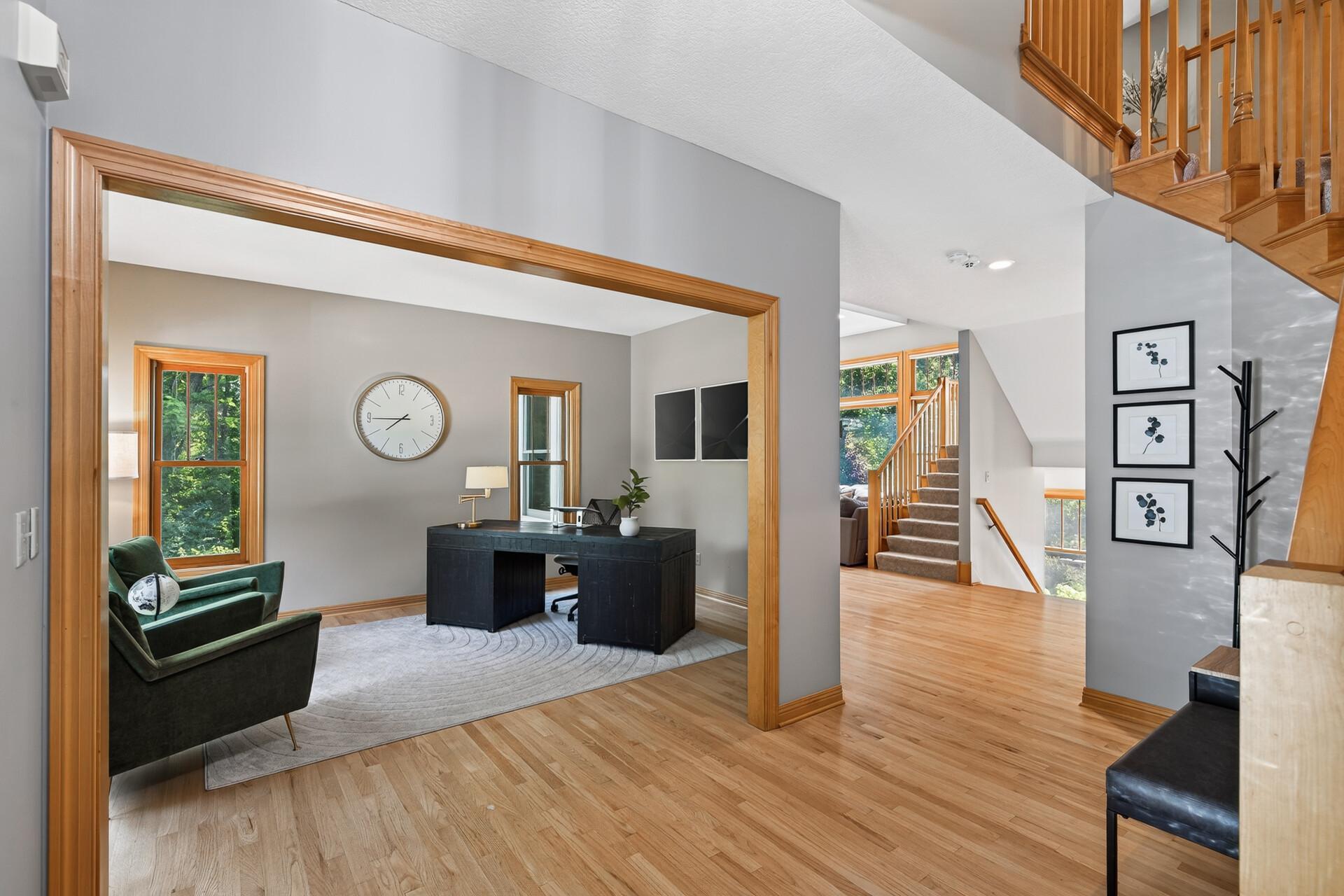 This angle reveals just how beautifully this flexible office space sits from the entry; a stunning first impression that immediately signals the quality and thoughtfulness found throughout every corner of this home.