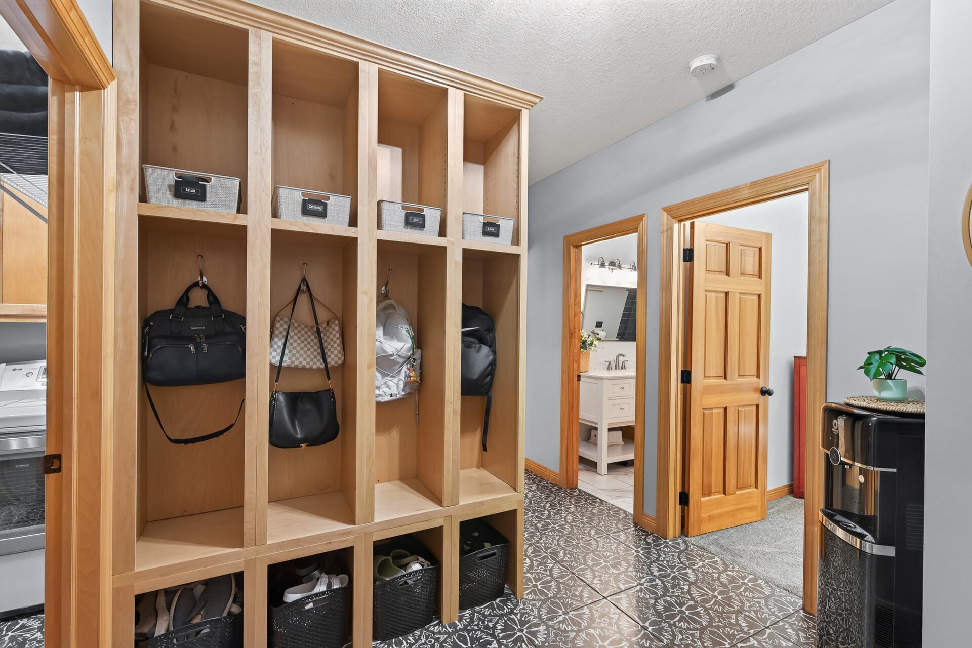 From custom cubbies to built-in storage and a dedicated closet, this mudroom was designed to handle real life; and it does it beautifully.