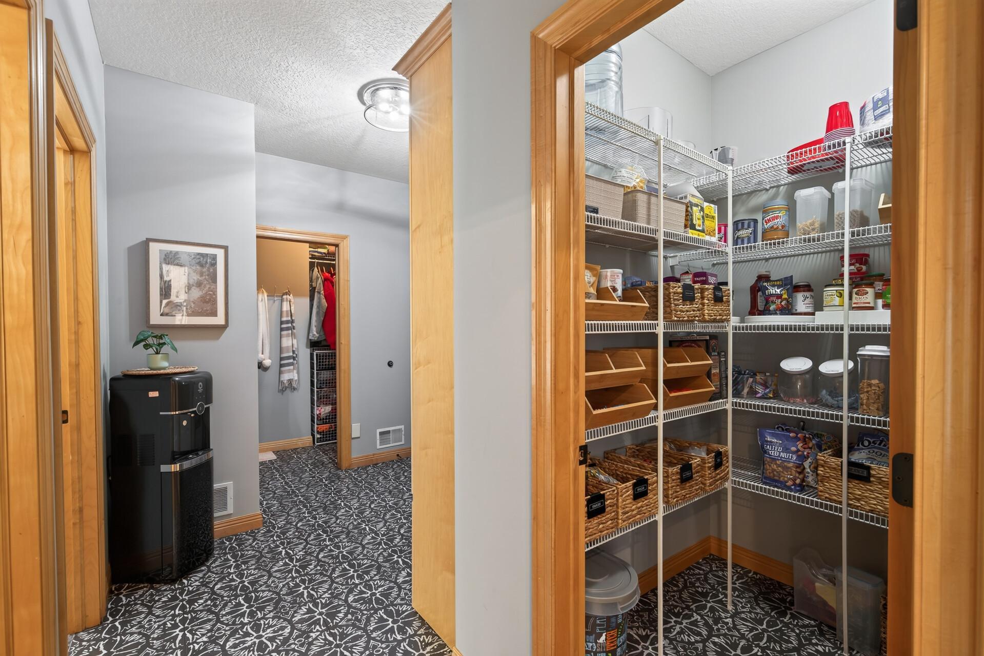 A large walk-in pantry puts the finishing touch on this extraordinary kitchen; because a kitchen this exceptional deserves storage to match. Plus designer tile flooring is a bonus!