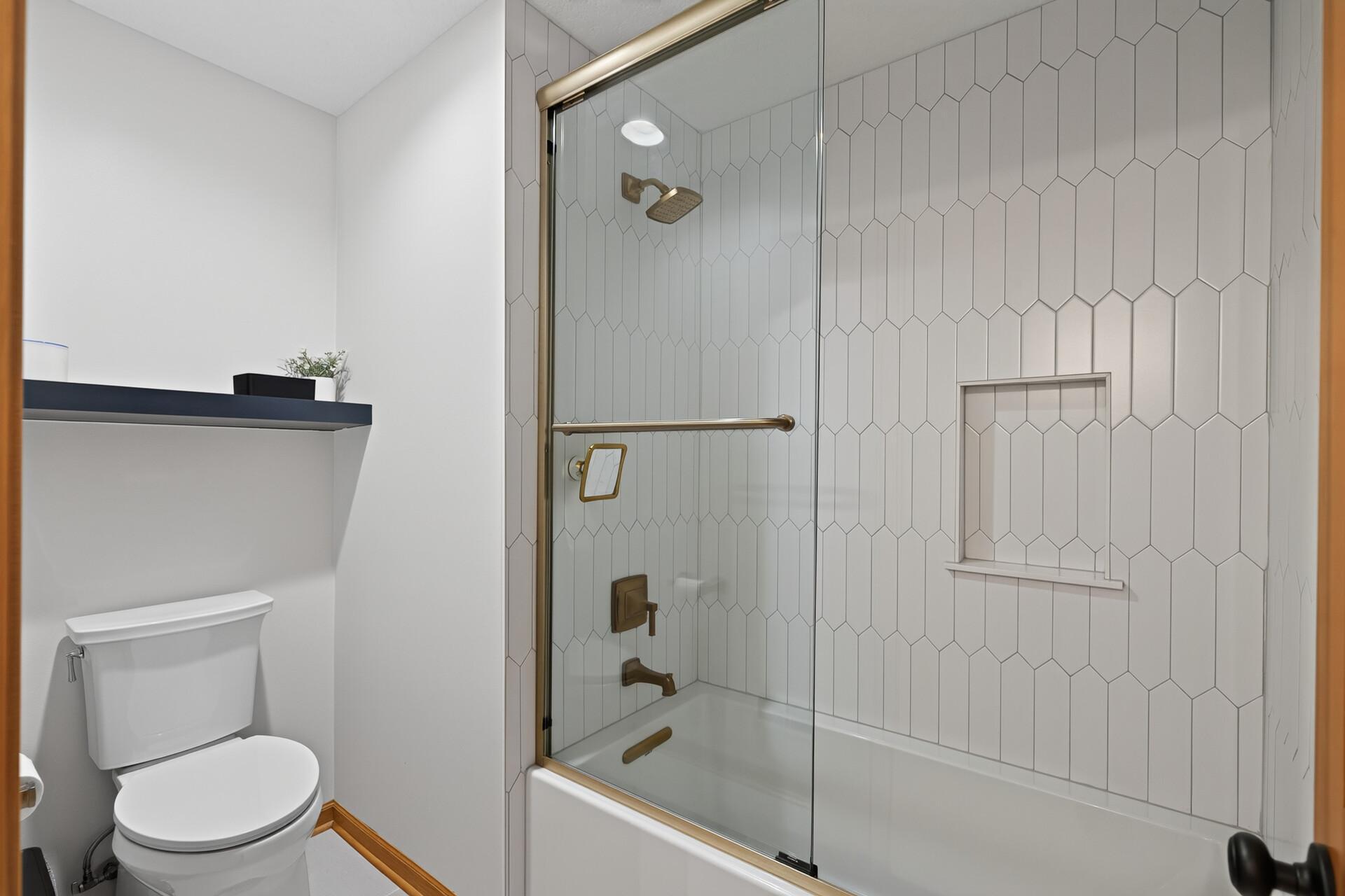 A private toilet and shower separate from the vanity area makes busy mornings completely effortless; get ready simultaneously without ever getting in each other's way. Thoughtful design that makes real family life run smoothly.