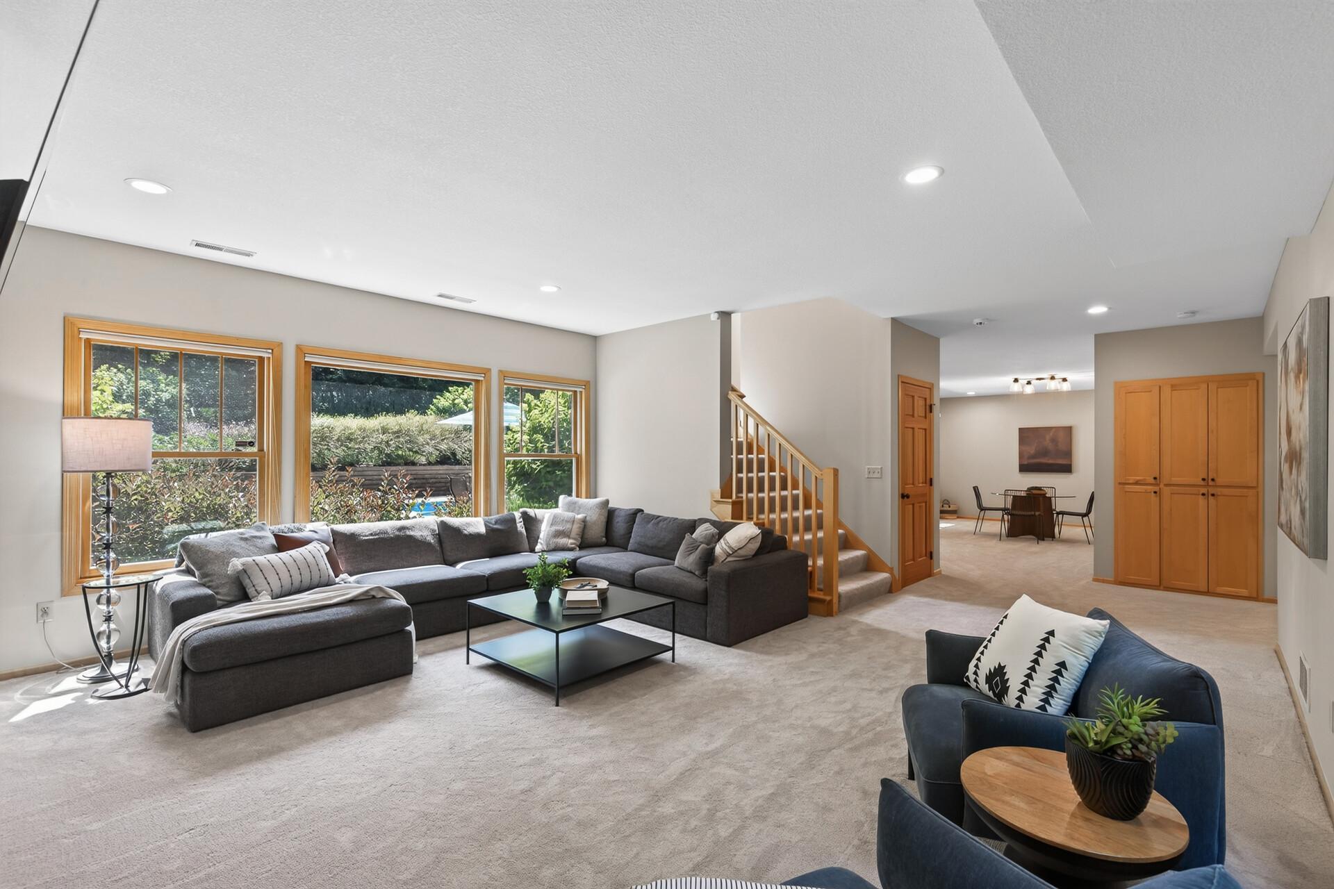 Just look at those windows; massive picture frame views that bring the beauty of the private wooded estate right into the family room and fill every corner with natural light.