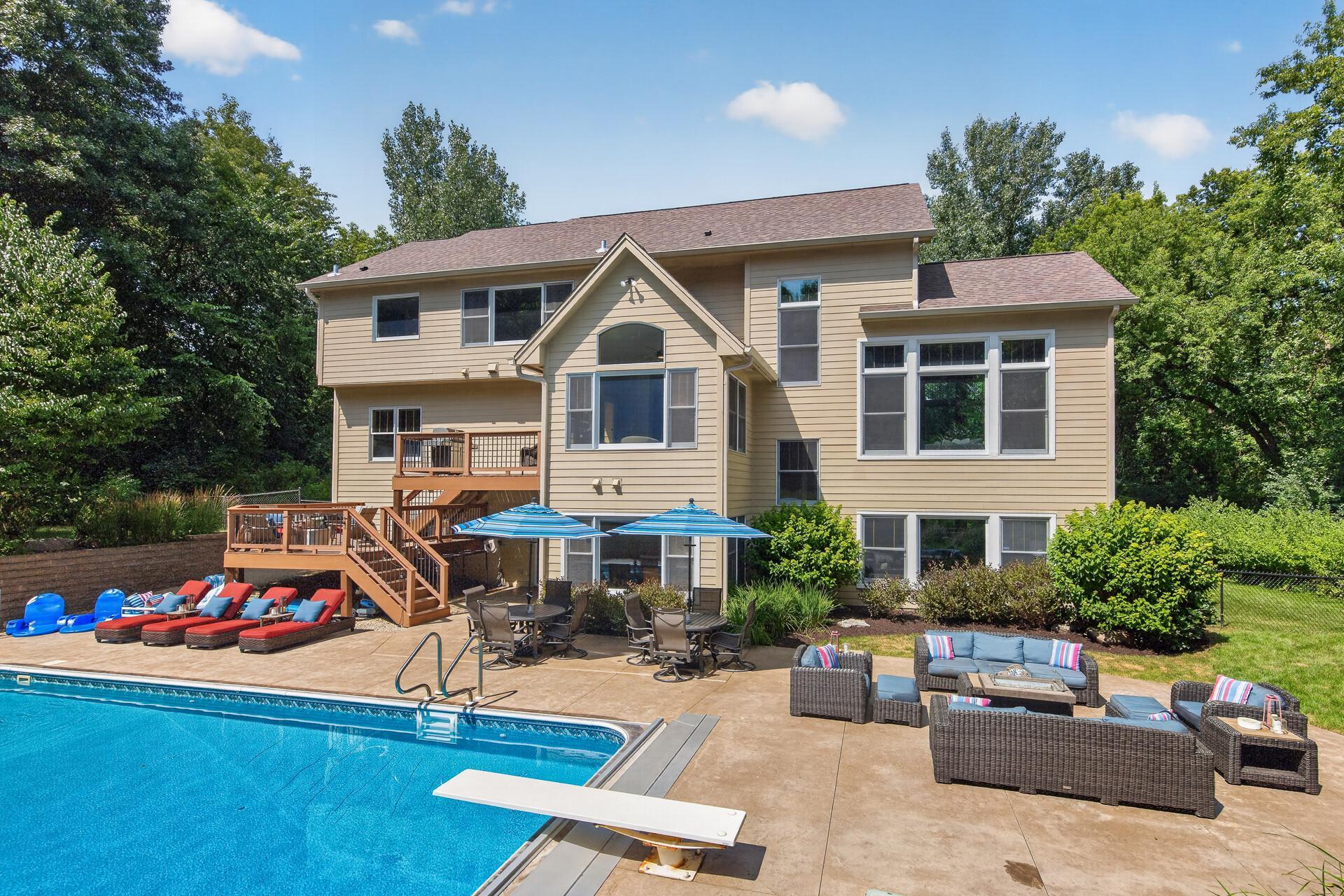 Step back and take it all in; the grand two-story exterior and the beautifully designed pool patio come together in perfect harmony to create an outdoor living experience that is as architecturally stunning as it is functional.