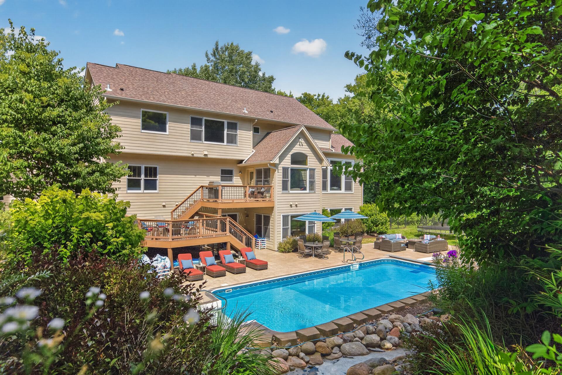 This view from the backyard says everything words cannot; a grand, impressive home surrounded by a stunning resort-style outdoor living space that together create something truly extraordinary.