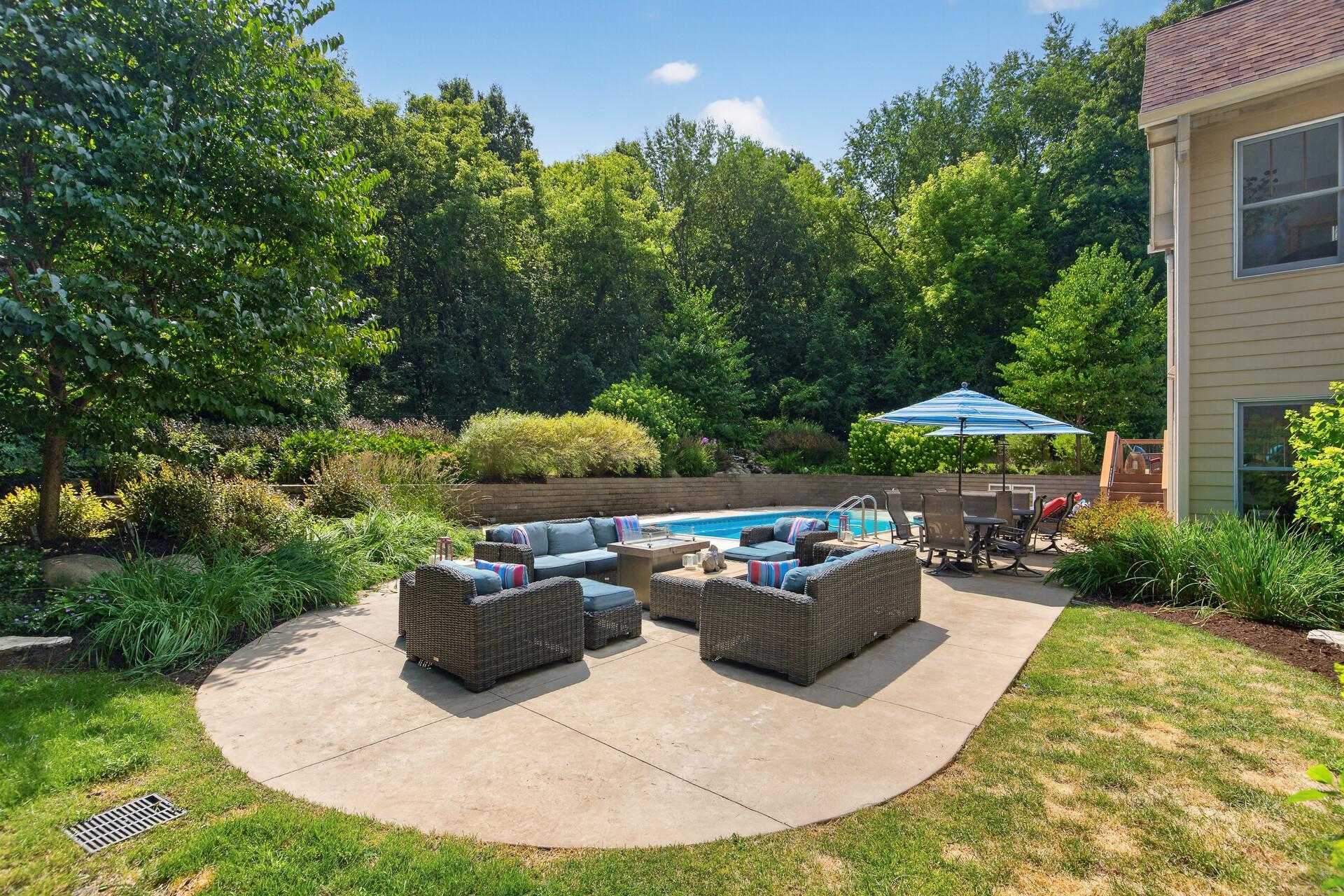 Lounge by the pool, play catch on the lawn, entertain on the stamped concrete, or simply wander through the landscaped grounds; this fully fenced backyard offers something for everyone and enough space to do it all at the same time.
