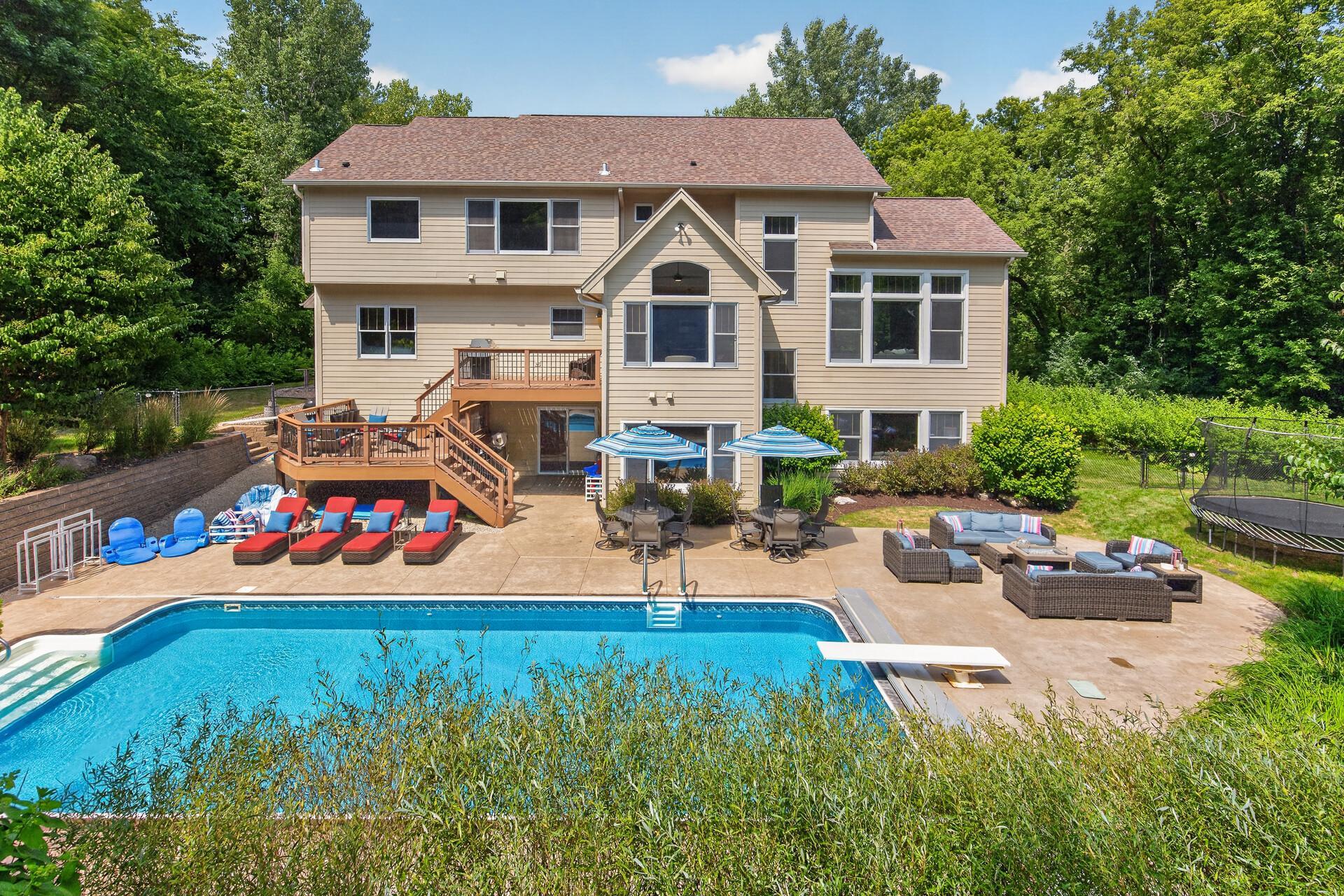 Fall in love; this breathtaking backyard features a resort-style pool and beautifully integrated entertaining space that transforms 3 private acres into your own personal retreat.