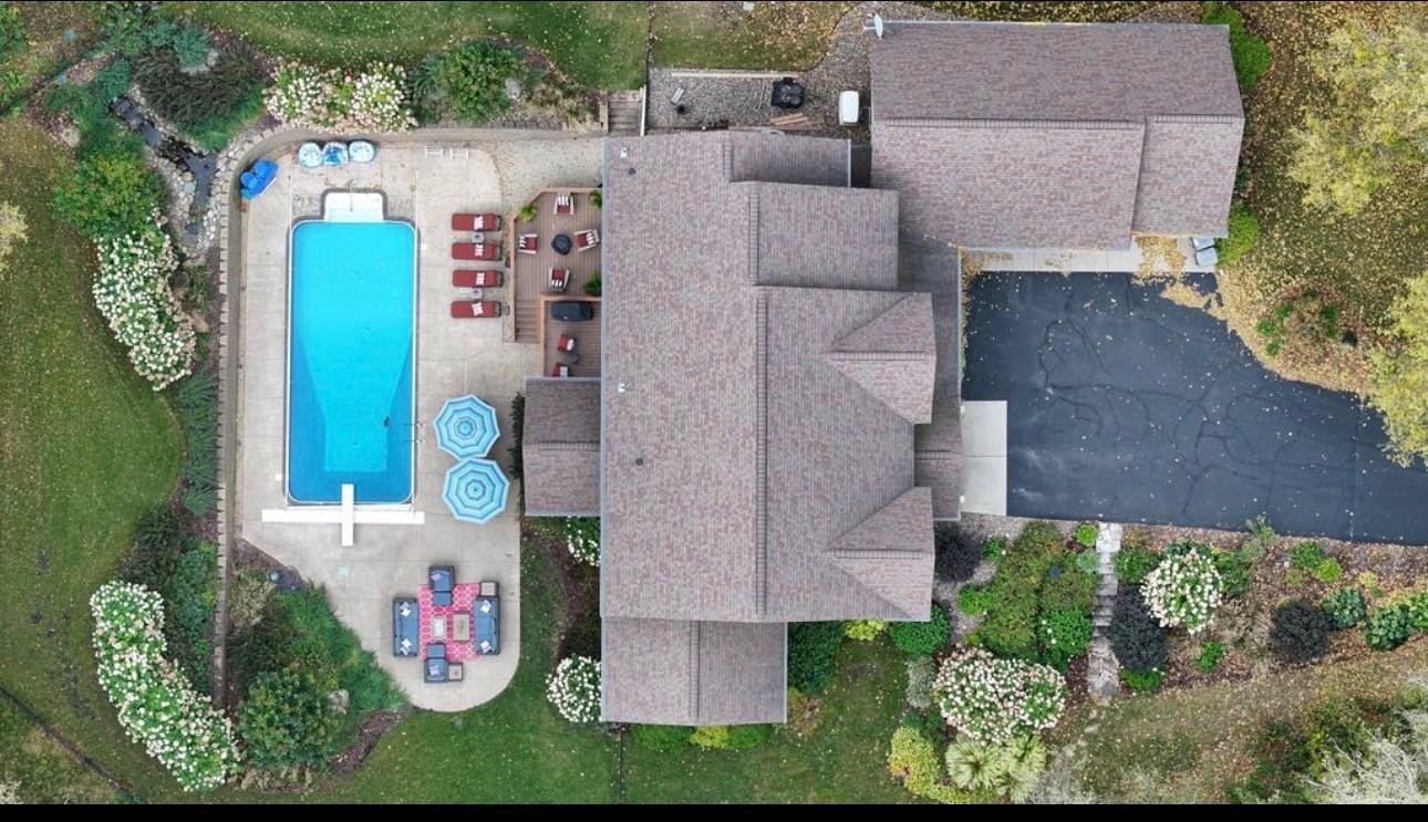 From above, this stunning estate takes on a whole new level of beauty when the white Annabelle hydrangeas burst into full bloom; a breathtaking seasonal display that reminds you this property was designed to be extraordinary in every single season.