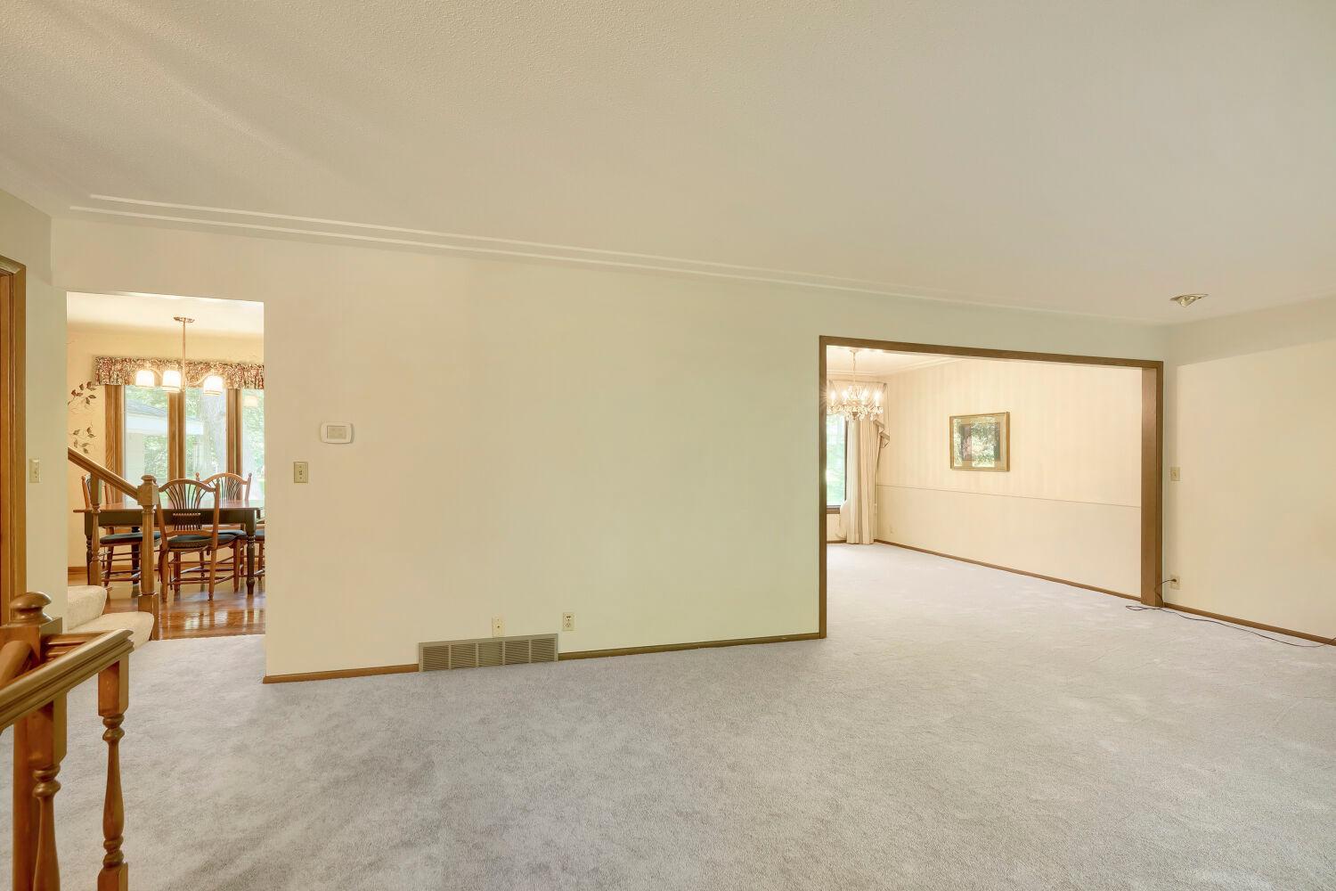 Looking at the informal dining and the formal dining room.