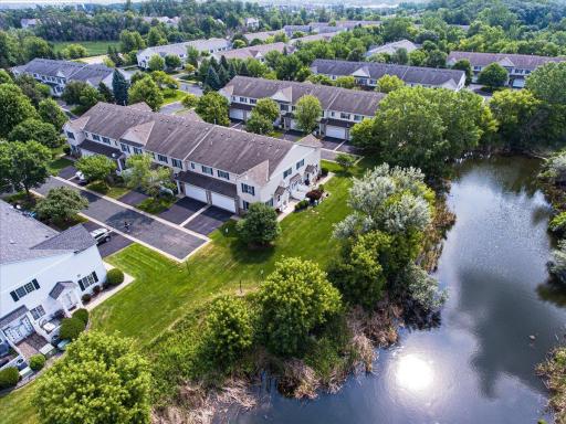 This 2 bed/ 2 bath home offers a spacious yard and a peaceful, private setting overlooking a mature treeline & pond.