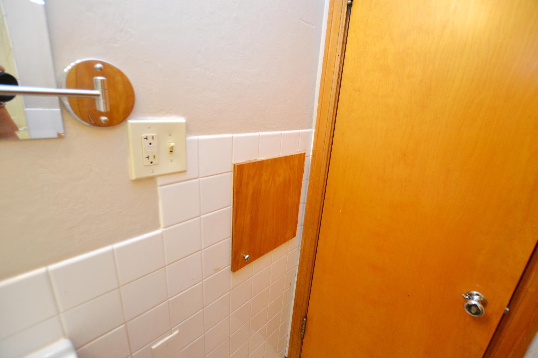 Yes it's a laundry chute in the main bathroom!