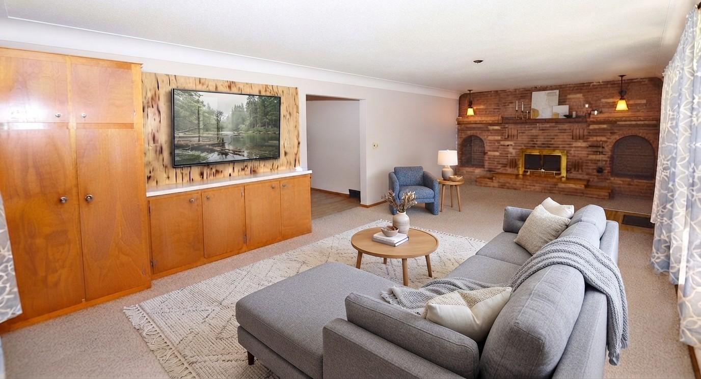 So much space in the main floor sitting room which can be converted back to add a formal dining are with the built in buffet! Additional buffet pieces will be left with the home. Virtually staged.
