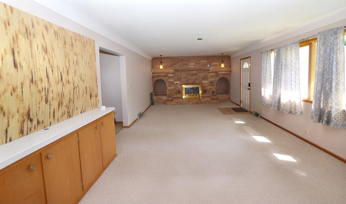 This room walks out to the backyard.