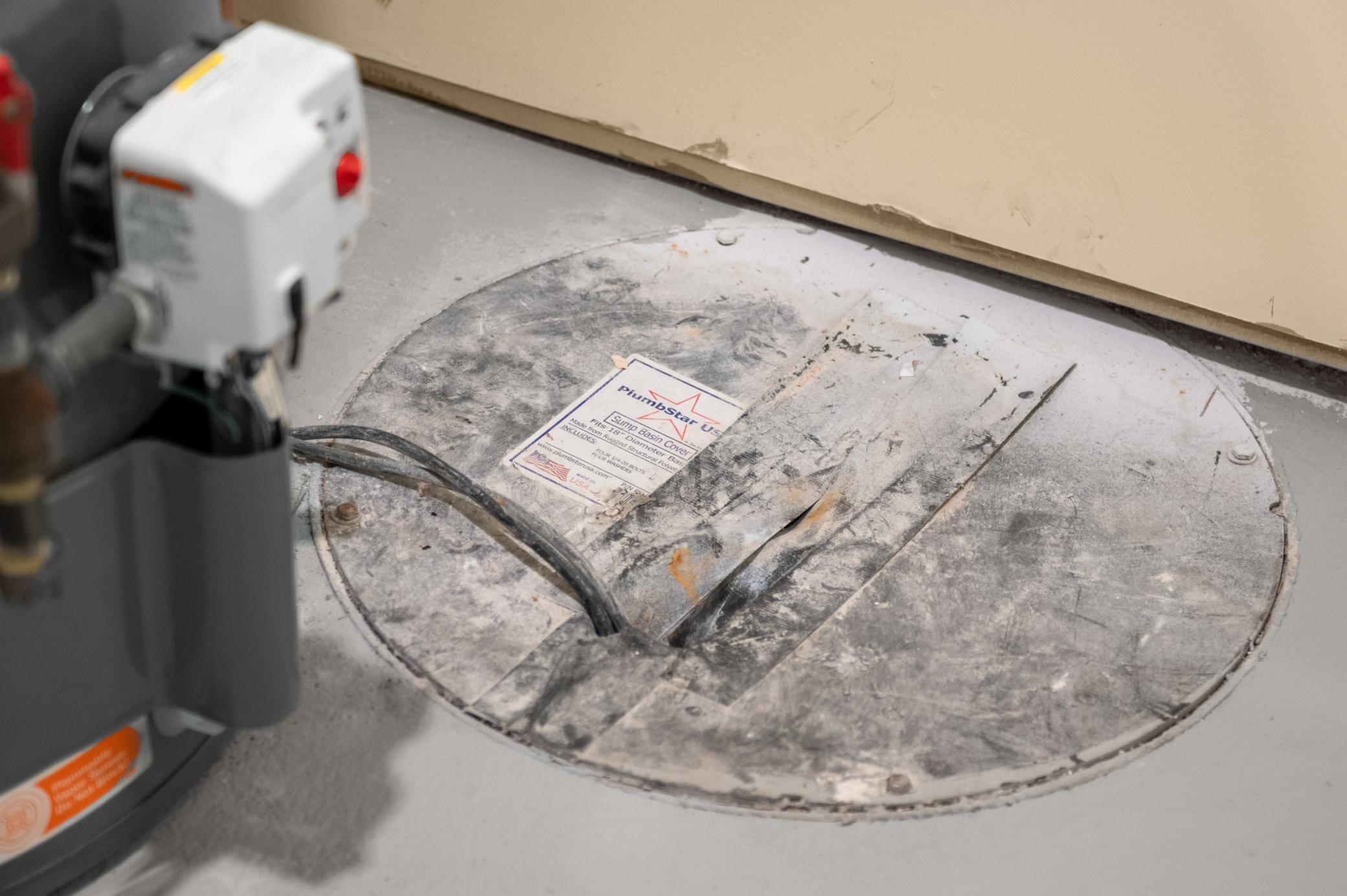 Brand new drain tile through foundation perimeter with sump basket and sump pump (discharge pipe hidden in the wall)