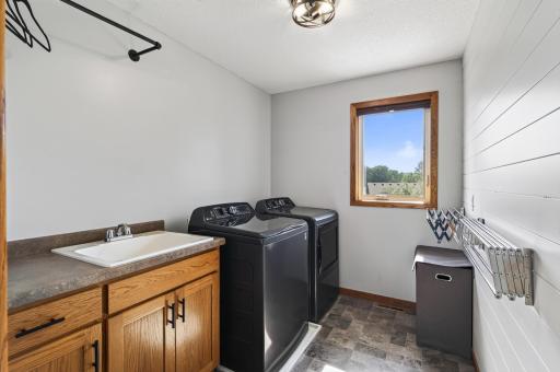 Upper Level laundry room. Plenty of space for additional storage.