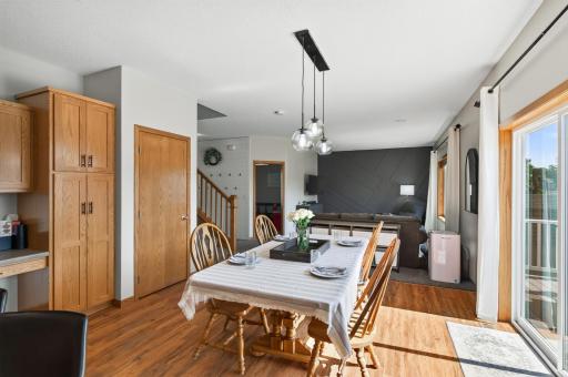 Be connected to all gathering spaces while in the kitchen.