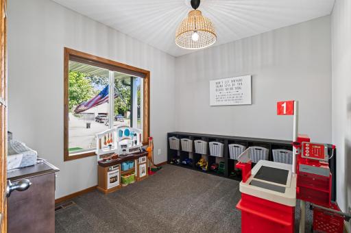 Flexible front room for work, play, or relaxation.