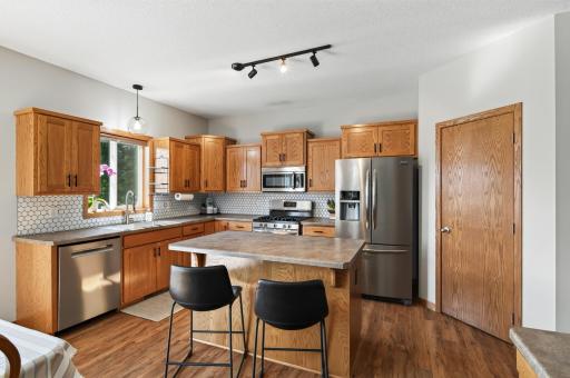 Stainless steel appliances with a new Bosch dishwasher (2024).