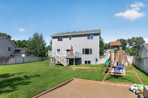 Fully fenced yard offers privacy for children and pets to play freely.