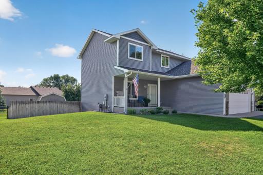 Spacious front yard with welcoming front porch.