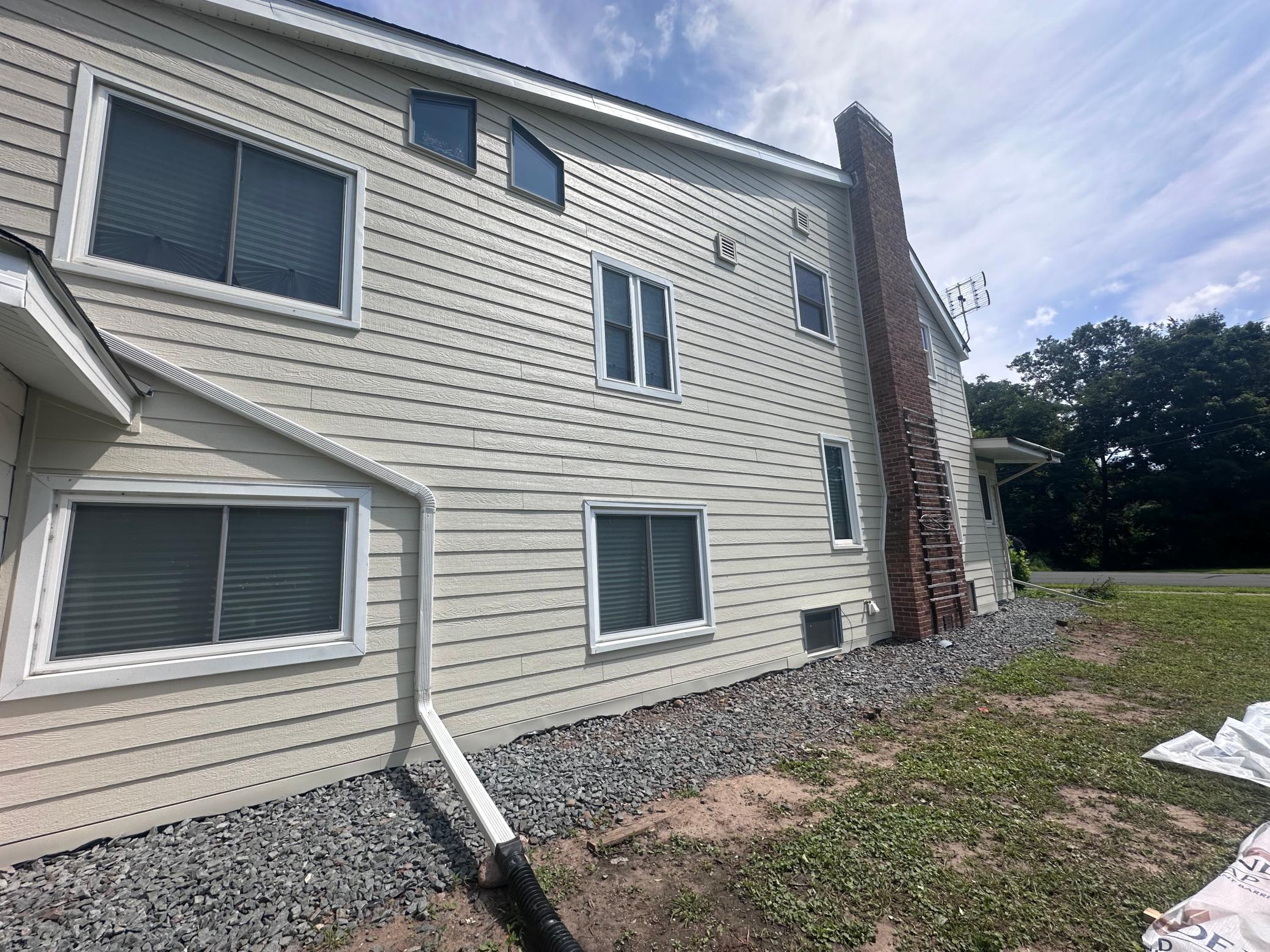 New siding and grading on one side!