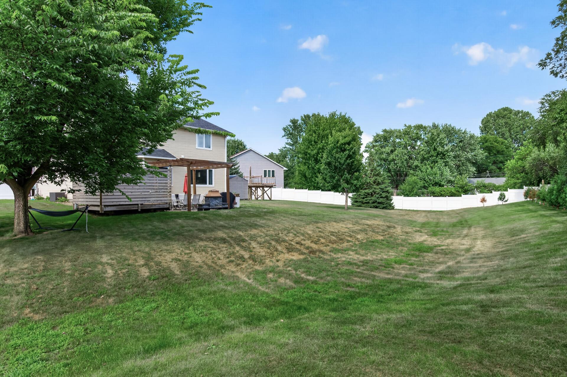 .68 acre lot fully fenced!