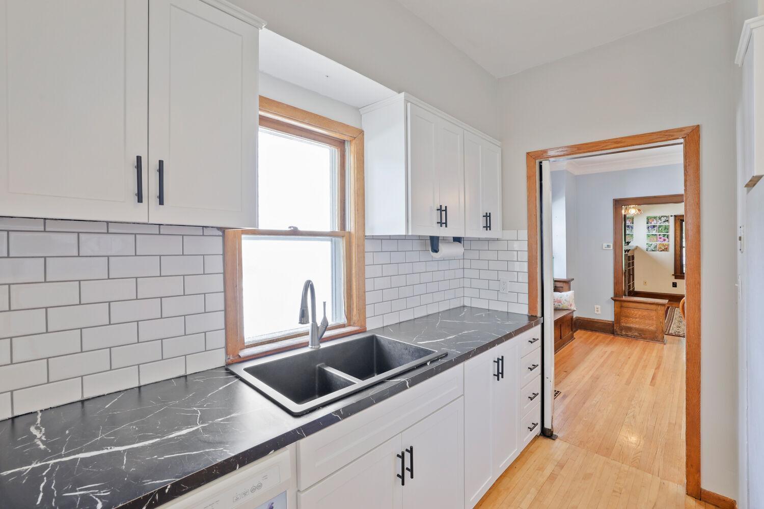 Kitchen features plenty of windows and counter space!