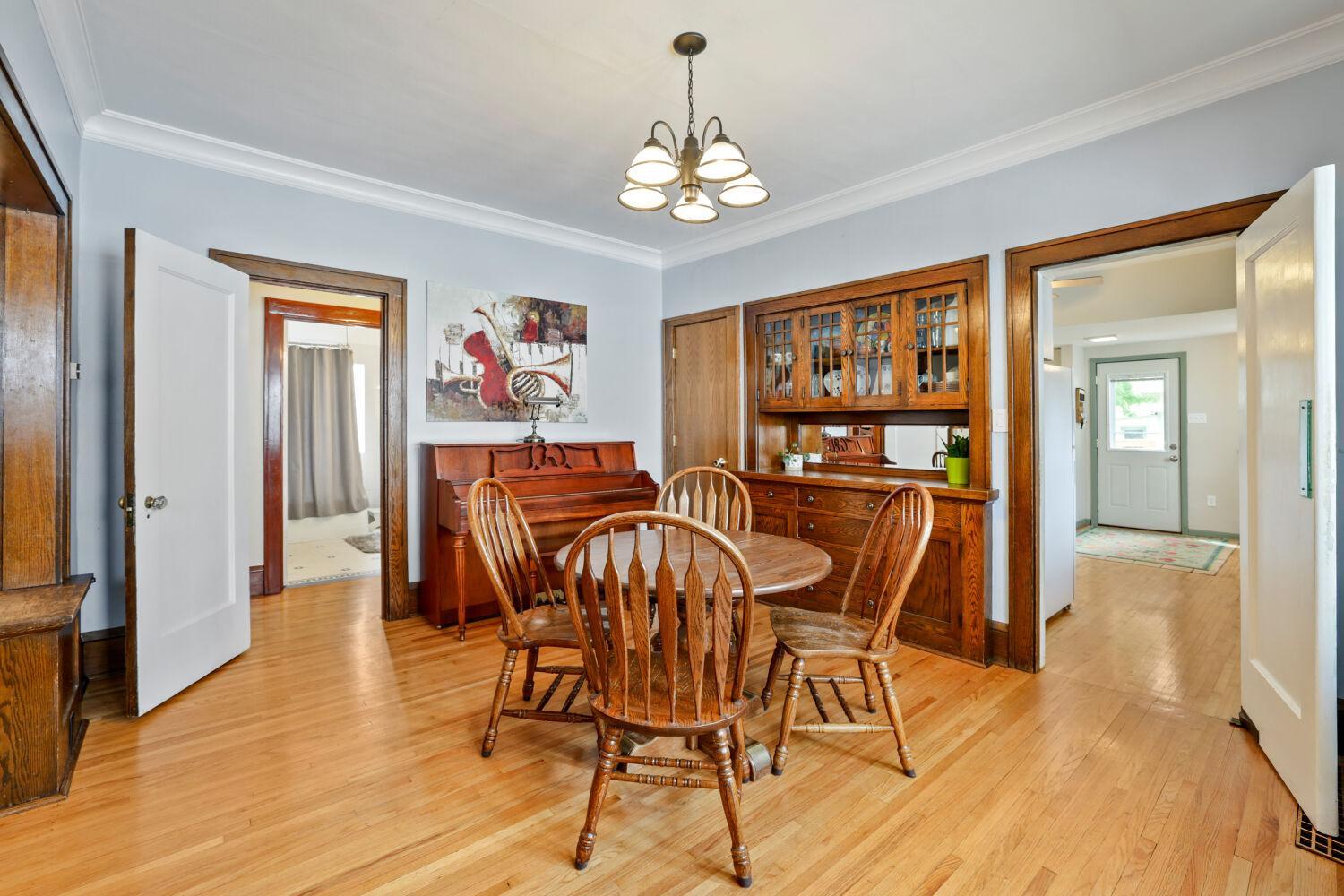 Large formal dining room with built-in cabinets!