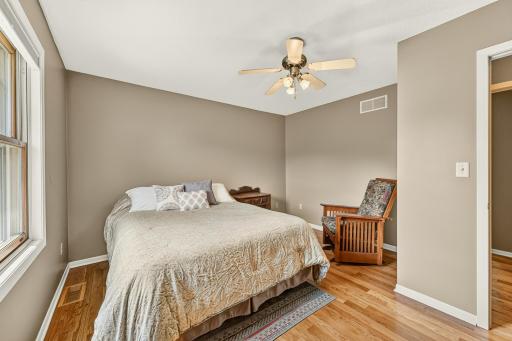 Bedroom 1 features ceiling fan and large closet.