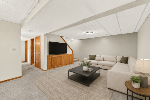 Spacious lower level family room (virtual staging).