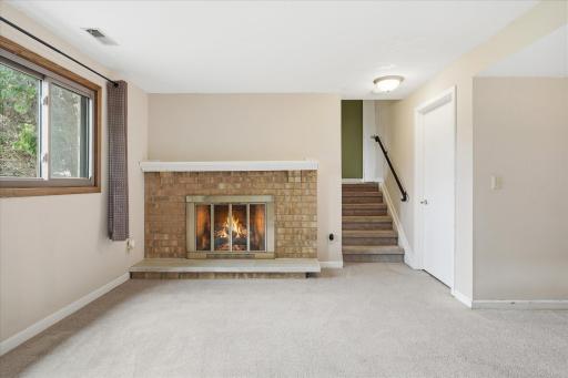 Family room with door to utility room on the right.