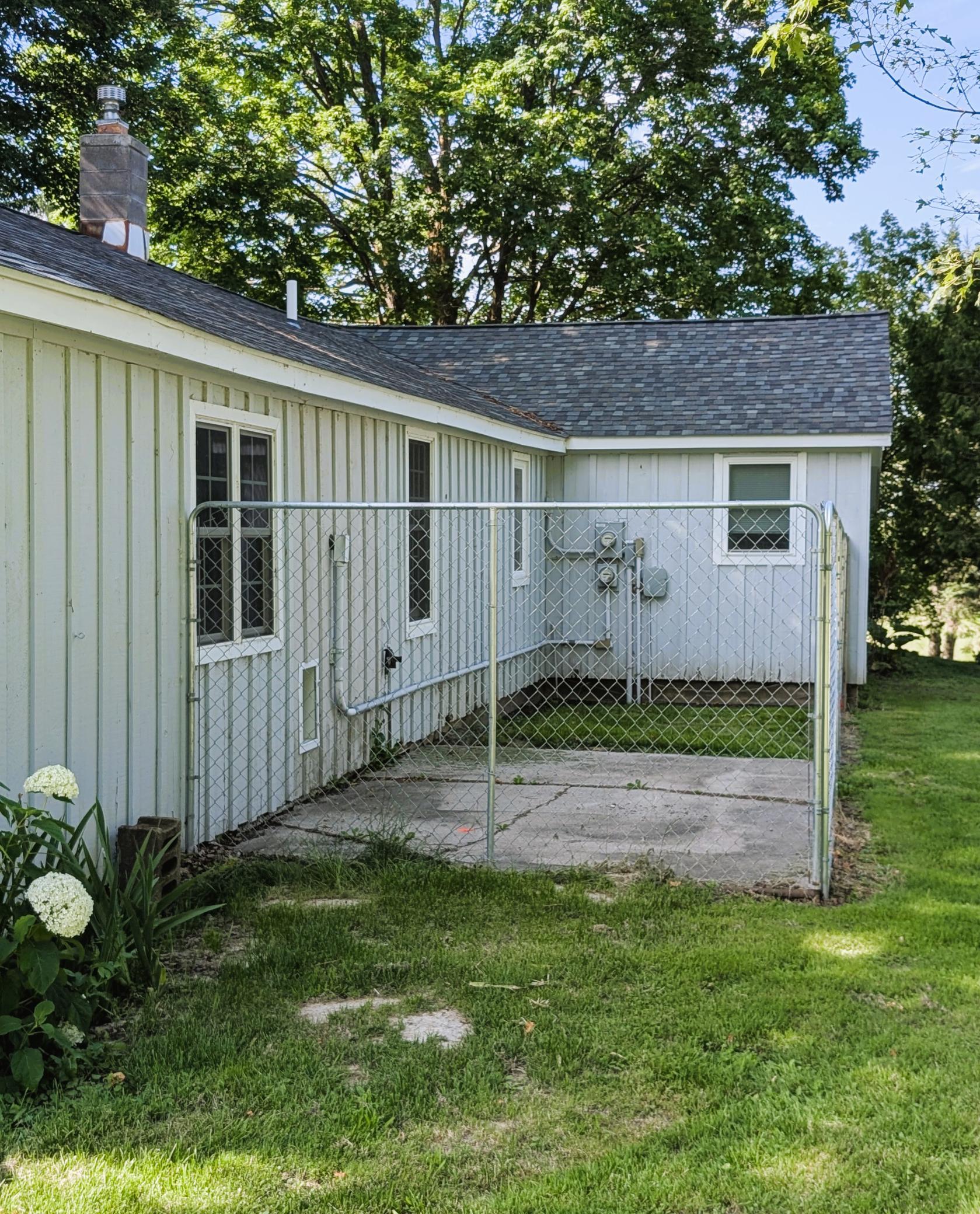 East side of the house fenced yard