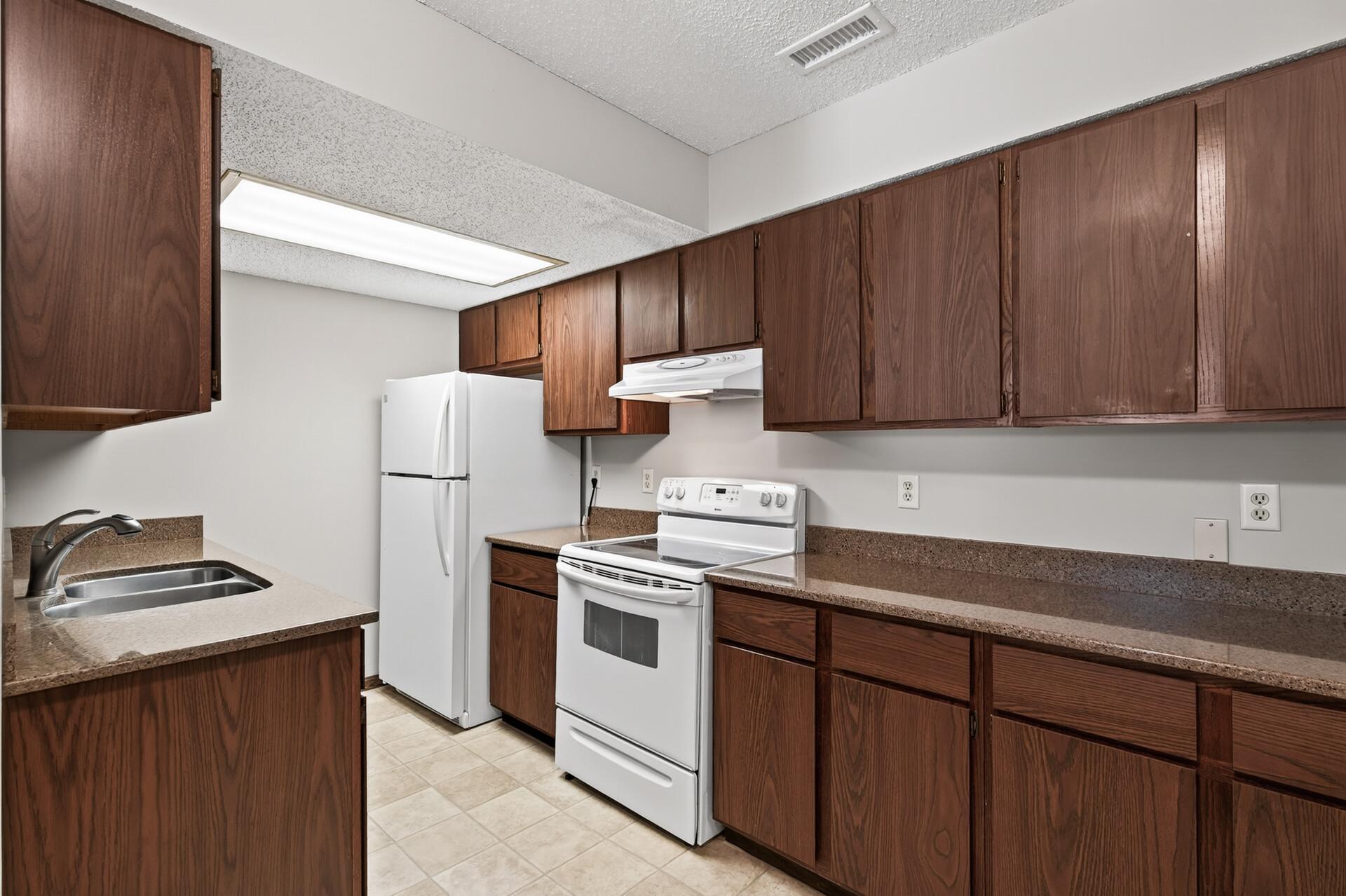 Kitchen features granite counter tops