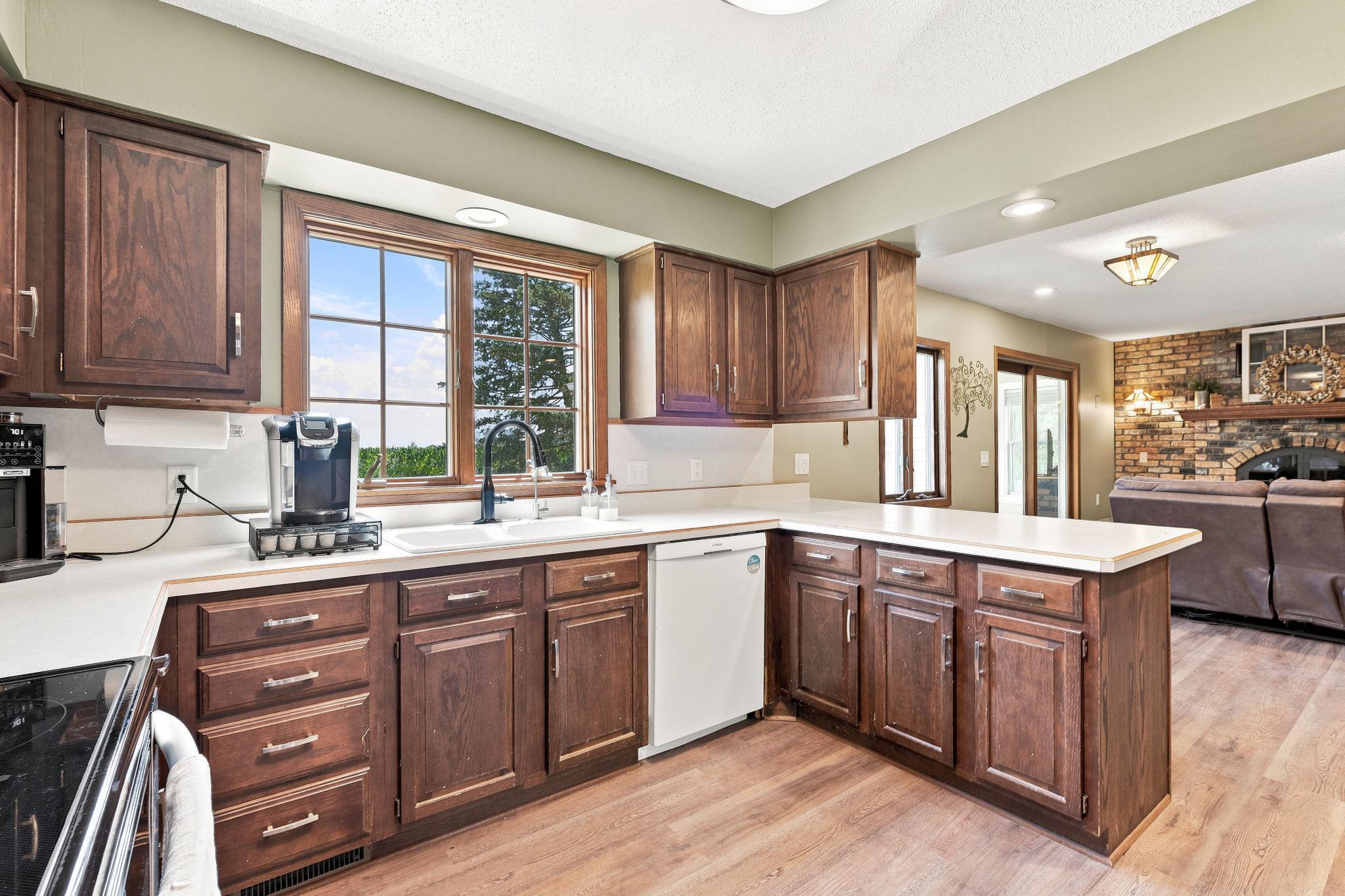 Kitchen with Abundant Cabinetry, Pantry, and Newer Appliances