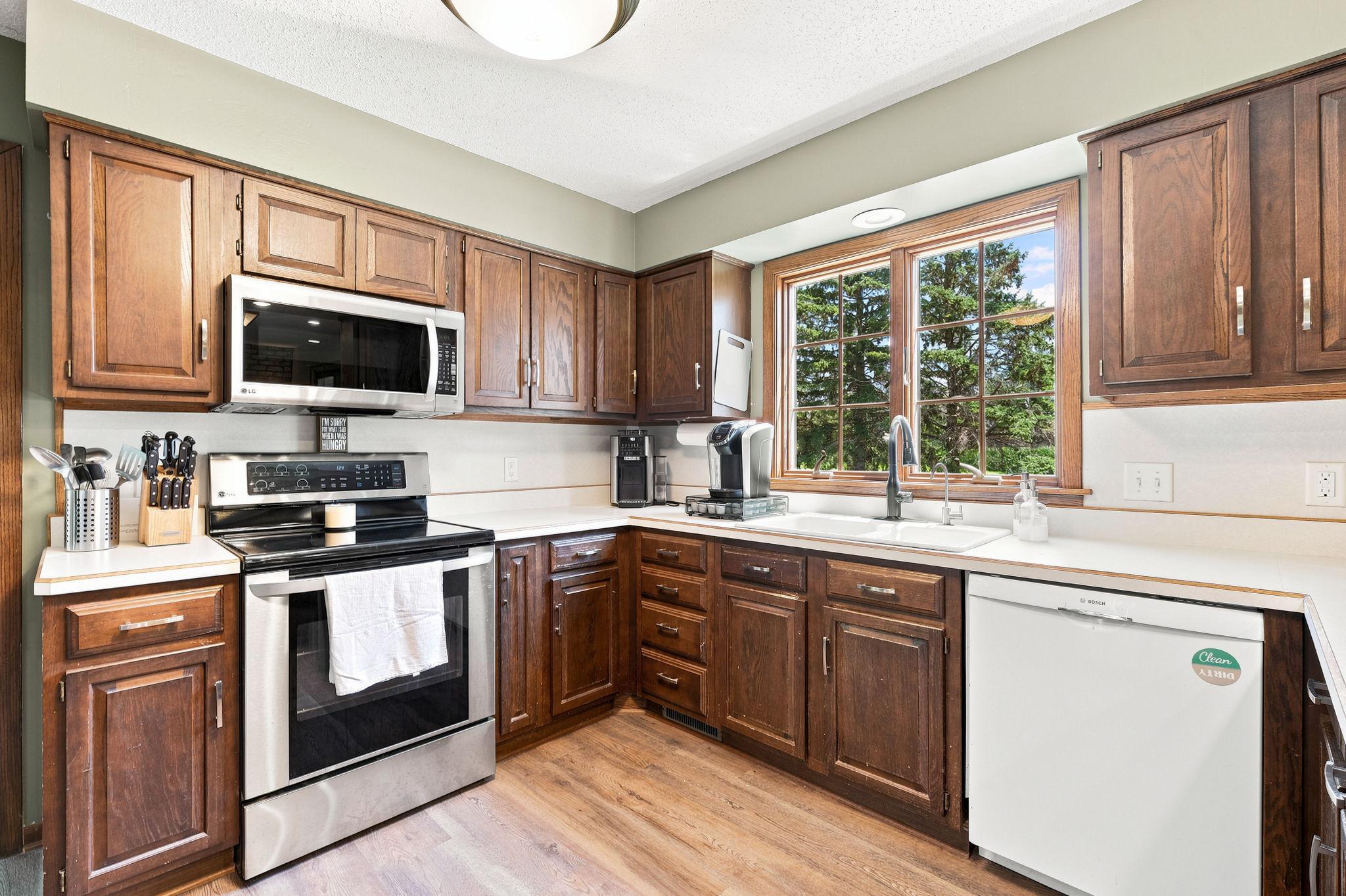 Kitchen with Abundant Cabinetry, Pantry, and Newer Appliances
