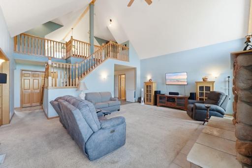 Ascend the stairs to the loft and two more bedrooms.