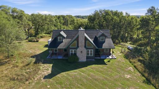 Morning coffee on your front porch? Primary bedroom walks out to front with golf course views.