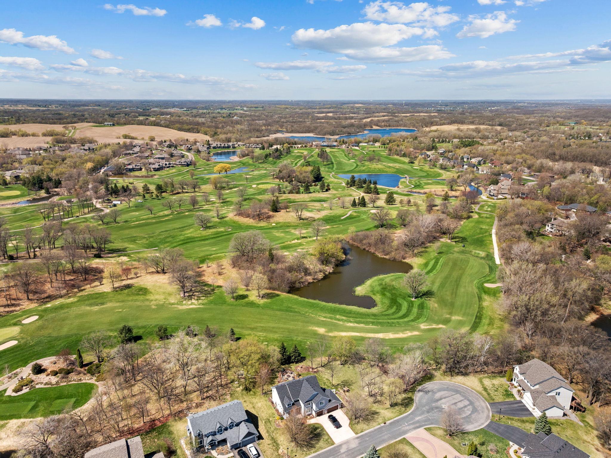 Surrounded by beautifully maintained green space and nearby golf courses, adding to the area’s charm and appeal.