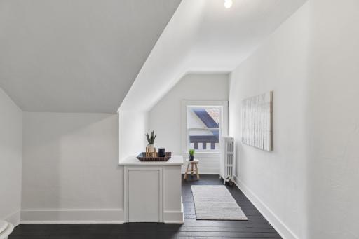 Convenient third-floor full bath serving the bedroom and additional living space.