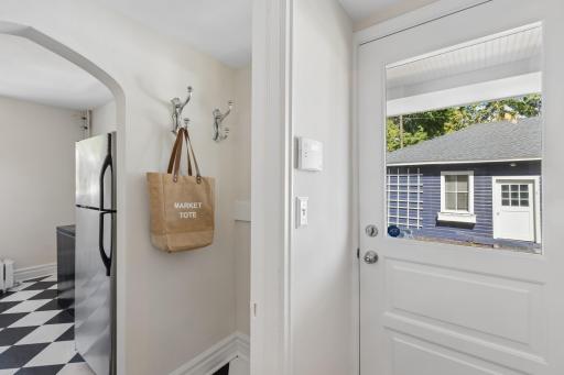 Convenient access to the backyard from the rear entry.