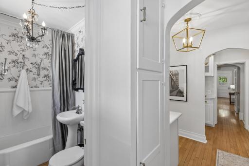 Rear mudroom entry with a convenient 1/2 bath nearby.