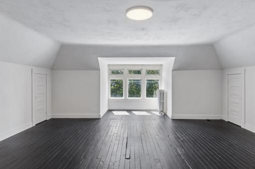 Third-floor family room or flexible space with plenty of room to make it your own.