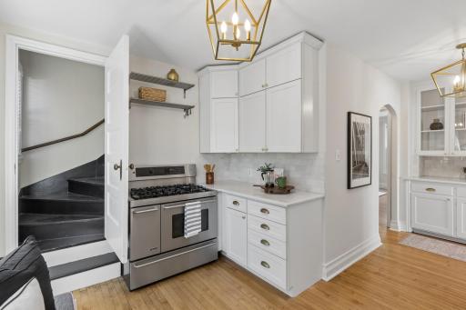 Stairs off the kitchen provide easy access to the second floor.