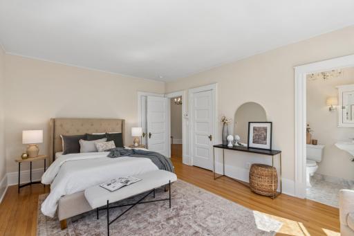 Bright and inviting primary bedroom with room to settle in and relax.