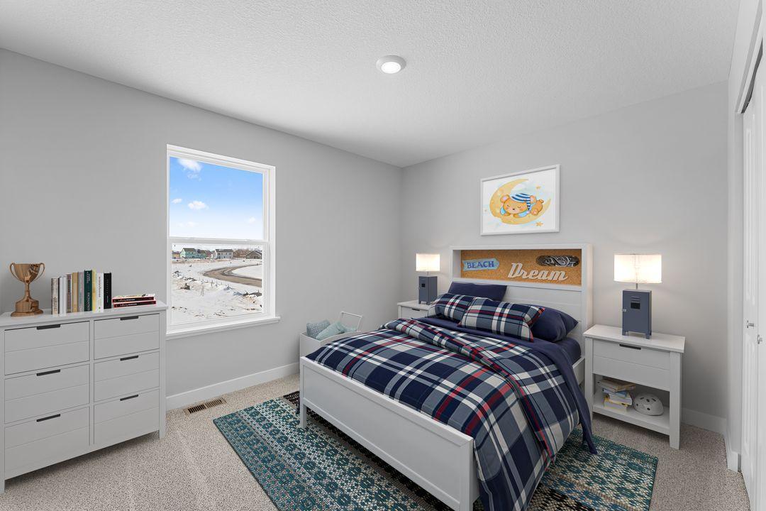 Another upper-level bedroom with abundant space and a walk-in closet! Photo of a virtually staged Model Home. Options and colors may vary. Ask Sales Agent for details.